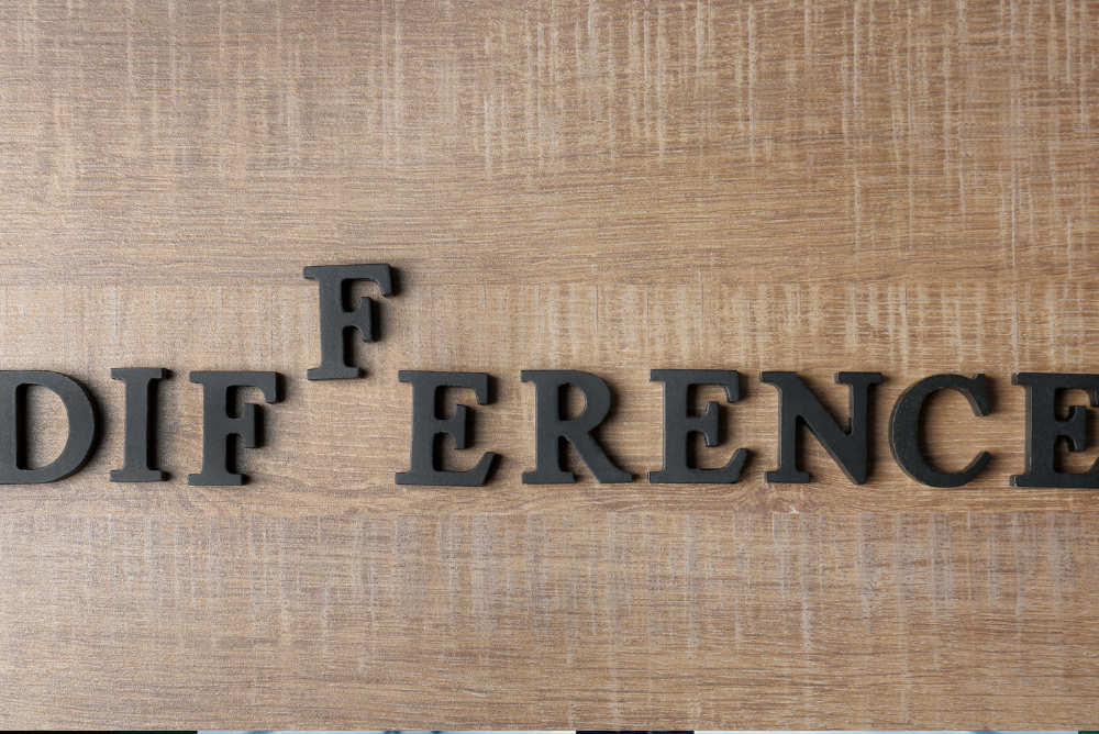 ''Difference'' written on a wooden board